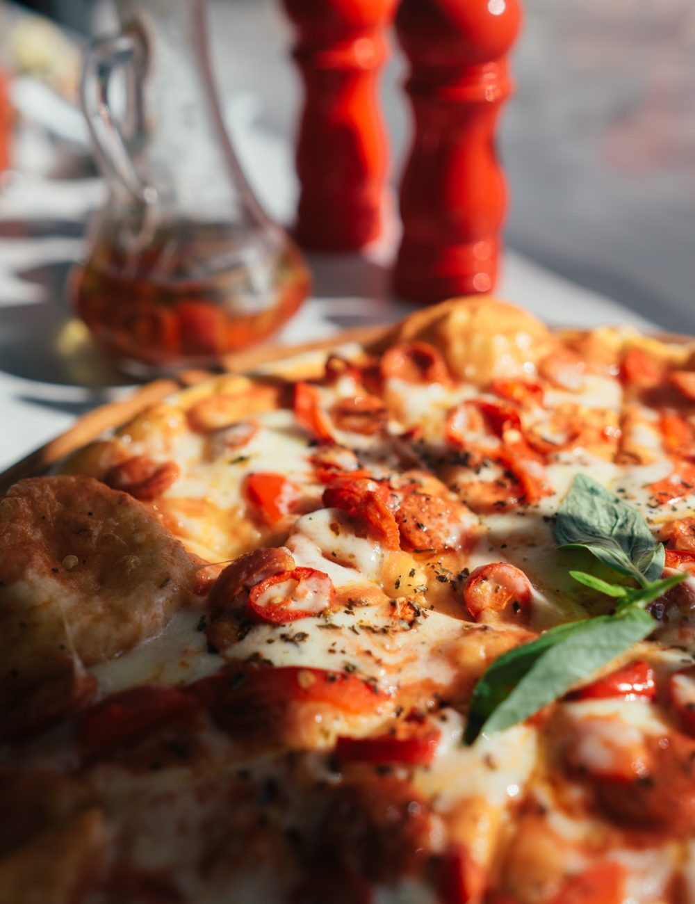 La-Tavola-pizza-on-table